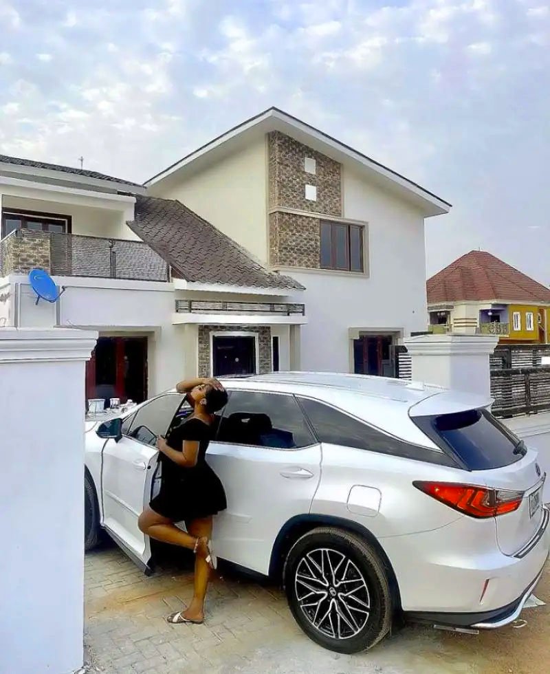 Destiny Etiko posed in her Enugu new home